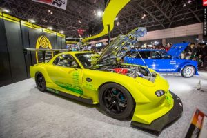 mazda-at-tokyo-auto-salon-2016-yellow-race-car-front-three-quarter-hood-up